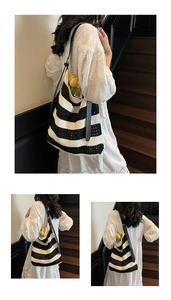 Détail du sac cabas en tricot rayé avec lanières en cuir noir et tulipe