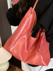 Minimalist coral red large capacity tote bag with marble texture and silver zipper detail