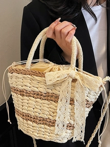 French style beige woven straw bag with lace bow and drawstring closure for beach vacation