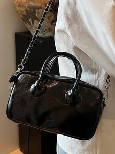 Glossy black baseball bag with chain strap and dual handles, 2025 trendy minimalist style