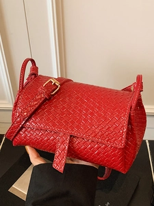 Chic red woven shoulder bag for women with gold buckle and white contrast stitching