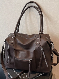 Retro dark brown pebbled leather tote bag with rivets and spacious shoulder strap