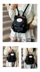 Détail du sac à dos noir brillant avec écusson Moon Shark et cordon de serrage
