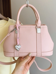 Pink lychee grain leather handbag with silver hardware and heart charm crossbody bag