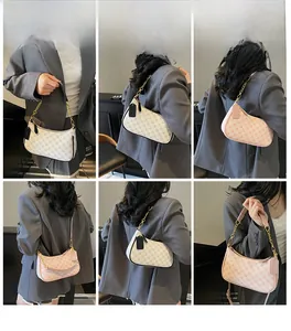 Detailed views of printed crescent shoulder bags in beige and pink with gold chain straps