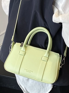 Lime green faux leather crossbody bag with lychee texture and adjustable strap
