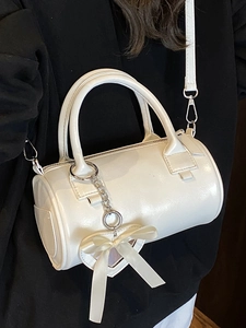 White cylinder Boston handbag with a satin bow heart charm for women in 2025 style