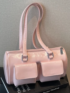 Pink glossy faux leather cylinder shoulder bag with double pockets for summer fashion