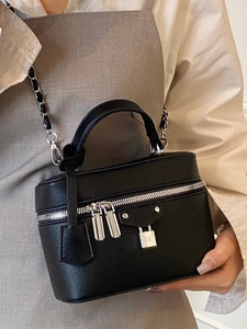 Chic black lychee grain leather crossbody bag with chain strap and silver hardware