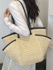 2025 large straw tote bag with black leather trim and woven texture for beach vacation