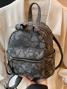 Mini sac à dos gris à motif floral jacquard et zips dorés pour femmes élégantes
