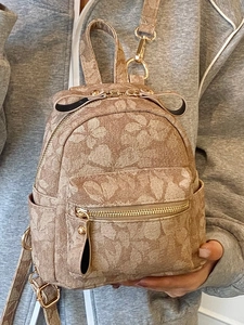 Mini sac à dos pour femme avec motif floral jacquard et fermetures éclair dorées marron