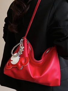 Red lychee leather crescent underarm bag with elephant charm and silver chain