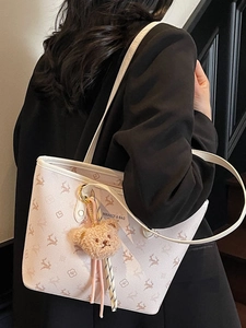 Chic beige tote bag with floral deer pattern and bear charm for stylish students