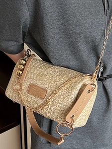 Sac cylindrique en paille pour femme avec bandoulière chaîne dorée et détails en cuir