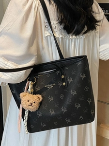 Chic black printed leather tote bag with bear charm and large capacity for daily use