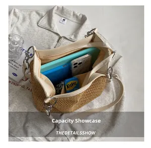 Capacity display of woven straw tote bag showing tablet, phone and spacious interior