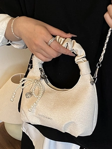 Chic beige pleated cloud handbag with heart pearl charm and chain strap for women