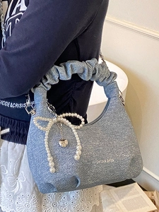 Blue denim pleated cloud bag with pearl bow pendant and heart charm for women