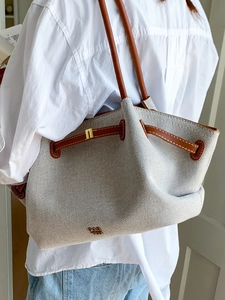 Large vintage canvas and leather tote bag for women with woven texture and top handles