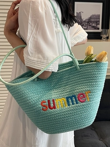 Large woven beach tote bag in light blue with summer embroidery and shoulder strap