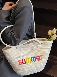 Large woven tote bag with colorful summer embroidery and slim white leather handles