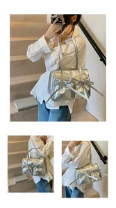 Detailed views of a silver metallic hobo bag with bow drawstring pockets and pleated design
