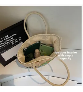 Top view of large capacity straw tote bag with drawstring lining for tablets and essentials