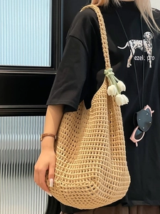Beige crochet hollow tote bag made of cotton rope for summer beach and casual daily use