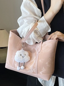Minimalist light pink underarm tote bag with marble pattern and cloud pendant