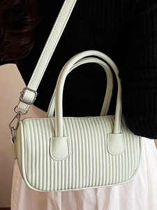 Retro mint green cylinder boston bag with vertical pleats and silver metal hardware