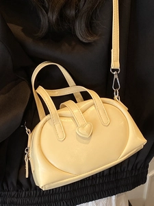 Stylish cream heart-shaped buckle dumpling handbag with crossbody shoulder strap for women