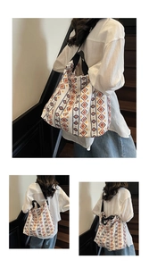 Detail of bohemian geometric print canvas tote bag with black strap and large capacity
