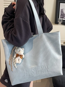 Light blue large capacity commuter tote bag with embossed H.SHAN lettering for women