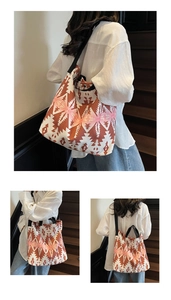 Detailed view of tribal geometric pattern canvas tote bag with magnetic metal buckle