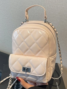 Chic beige quilted patent leather mini backpack with silver twist lock and chain strap