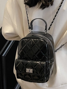 Classic black quilted leather mini backpack with silver chain strap for women