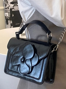 Fashionable black square handbag with 3D floral decoration and silver chain strap