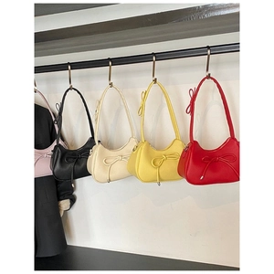 Minimalist dumpling style underarm bag with bow decoration in five vibrant colors