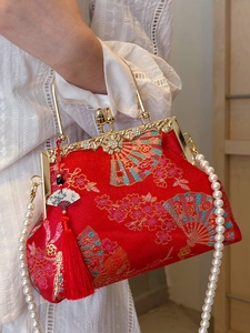 Elegant red Chinese style evening bag with floral embroidery and pearl chain strap