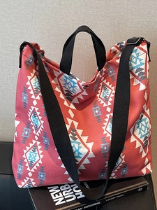 Retro red canvas tote bag with geometric ethnic print and dual carry straps