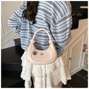 Pink minimalist crescent hobo bag with COIN 'ADN print and metal chain detail