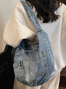 Large capacity vintage blue denim crossbody bag with exterior pockets for women's daily commute
