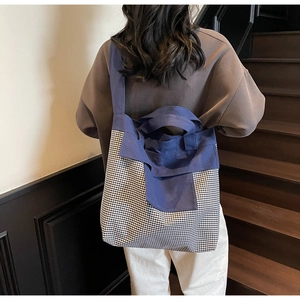 Fashionable large canvas tote bag with blue vichy check pattern and long shoulder straps