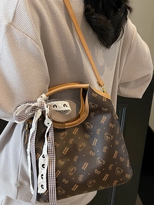 Classic brown tote bag with bear print and ribbon detail for women's daily commute