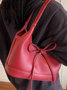 Chic red PU leather tote bag with bow detail, stylish large capacity shoulder handbag