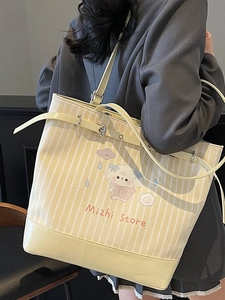 Borsa tote a righe verticali con stampa a cartoni e tracolla in pelle regolabile