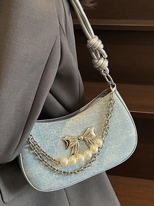 Chic light blue pleated crescent shoulder bag with silver bow and pearl chain decoration