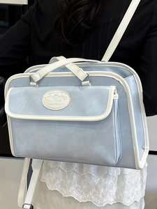 Minimalist light blue and white contrast tote bag for commuting with top handle and logo