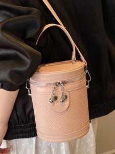 Borsa a secchiello rosa cilindrica con trama intrecciata e dettaglio cuore per donna